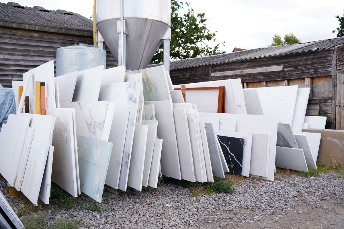 Stone slabs stacked at the VK Marble Group yard